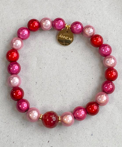 3D Perlenarmband in der Farbe pink, rot,rose und goldfarbenem ANNEMI Label, Wunderwerk Oldenburg