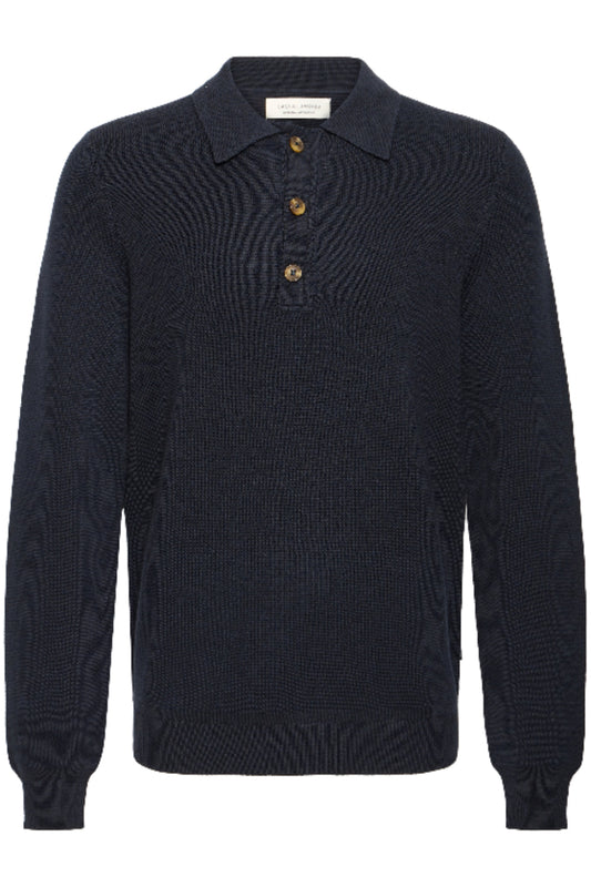 Dunkelblauer Feinstrickpullover mit Polokragen, kurzer Knopfleiste mit drei Knöpfen und langen Ärmeln Wunderwerk Oldenburg