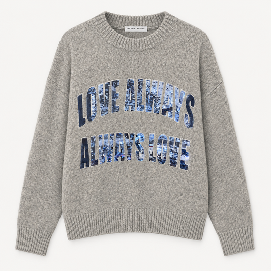 grauer  Pullover mit Paillettenaufschrift Wunderwerk Oldenburg